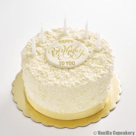 Premium Photo | White birthday cake over light grey.food concept  anniversary background.